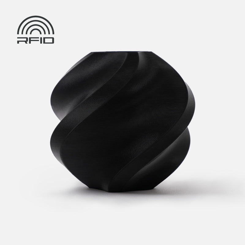 Bambu PLA-CF black 3D printing filament on reusable spool, available in UAE